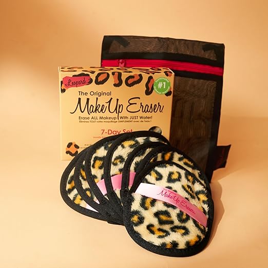 A set of seven leopard print MakeUp Eraser cloths and one black laundry bag with a red zipper.