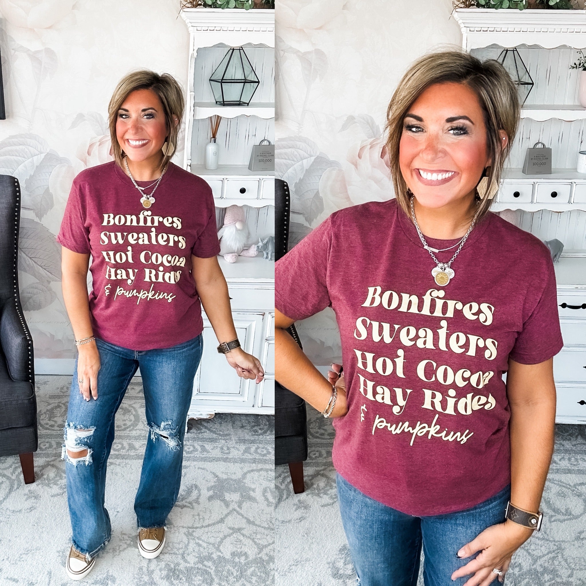 Woman wearing a maroon t-shirt that reads,  'Bonfires, Sweaters, Hot cocoa, Hay Rides and Pumpkins.' written in a cream text.