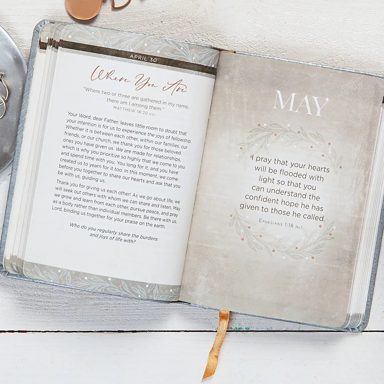 Devotional opened to a page titled "Where You Are" laying on a white surface.