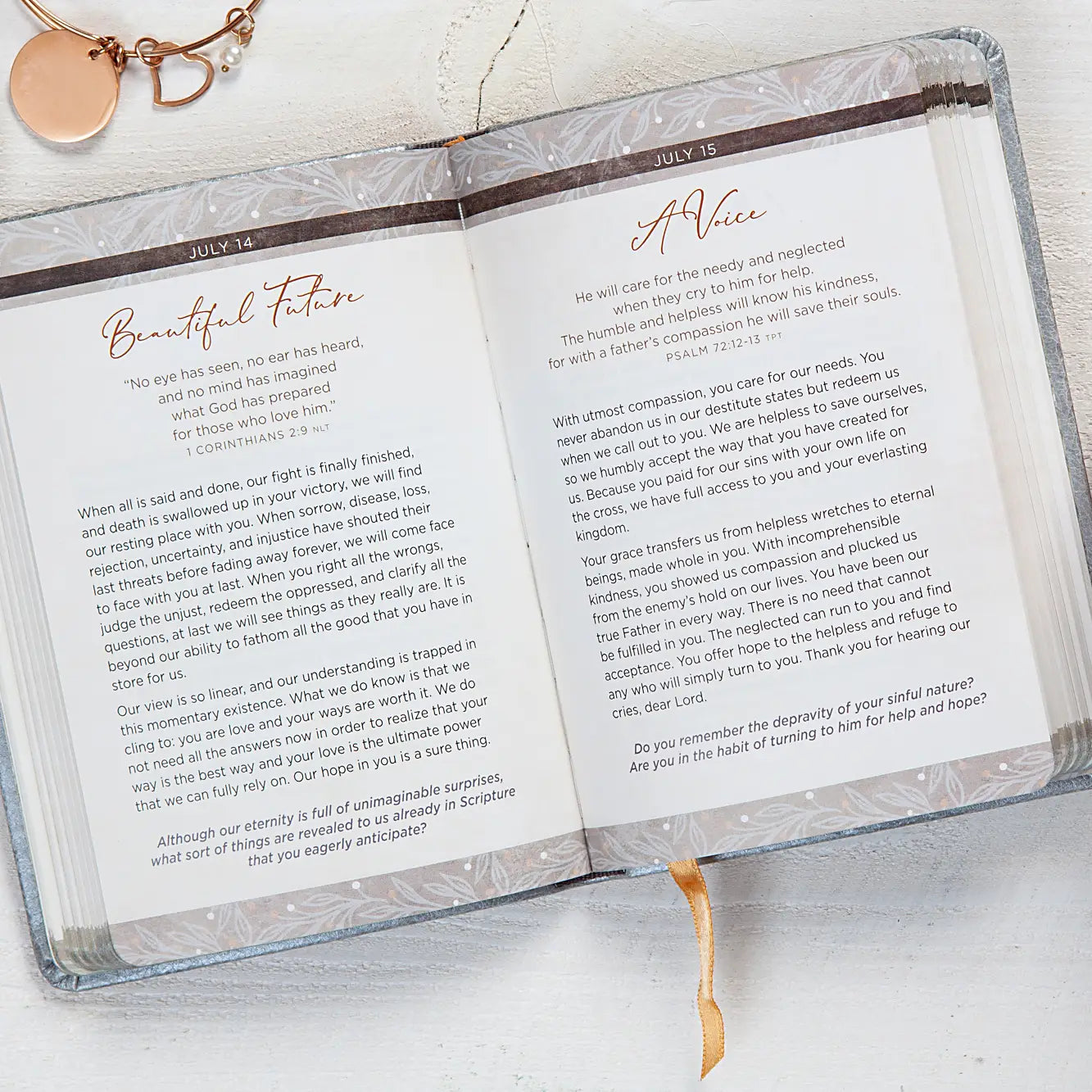 Devotional opened to a page titled "Beautiful Future" and "A Voice" laying on a white surface.