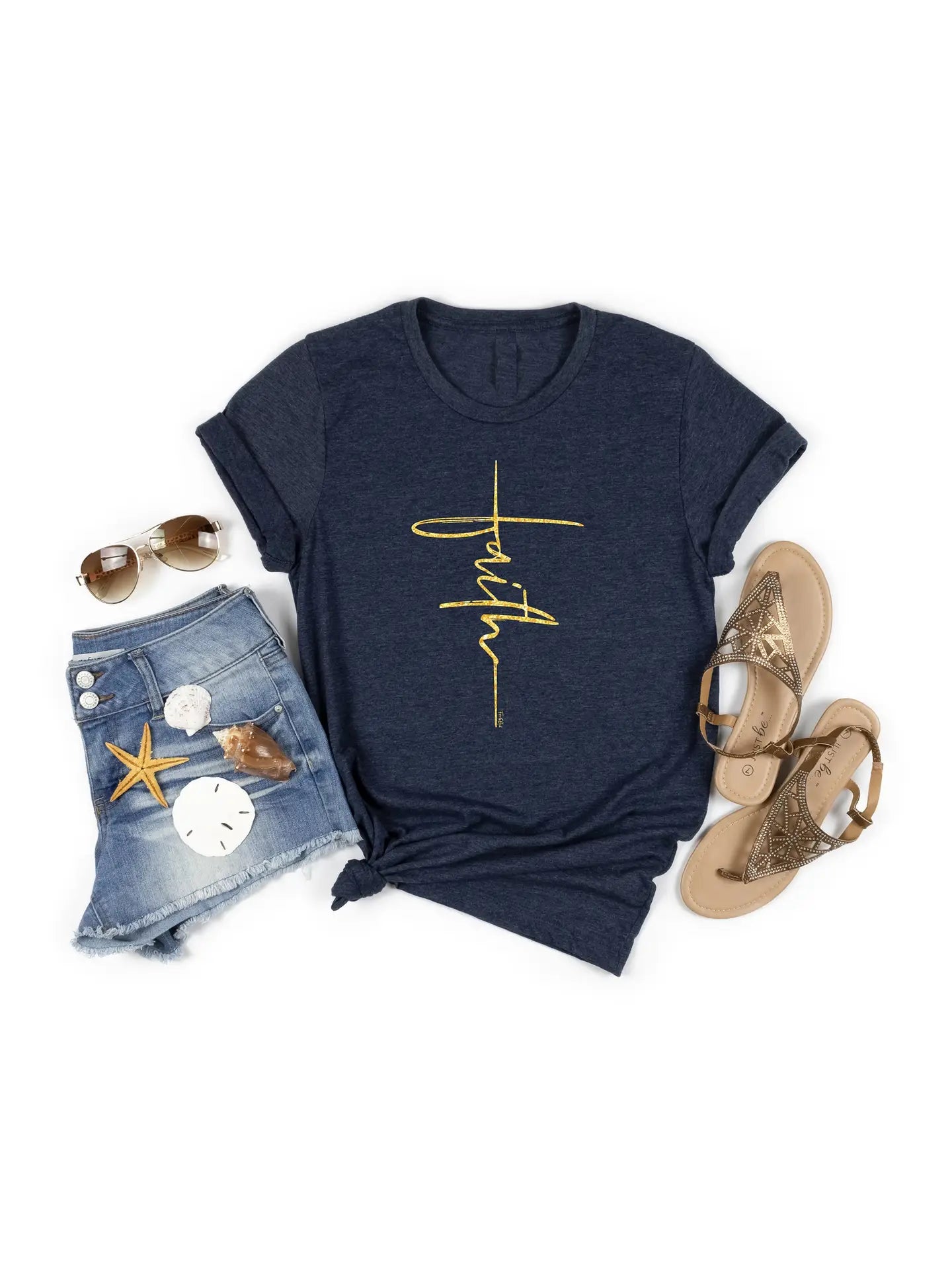 Navy crew neck t-shirt with a vertical gold cross graphic with the word 'Faith' written in it.