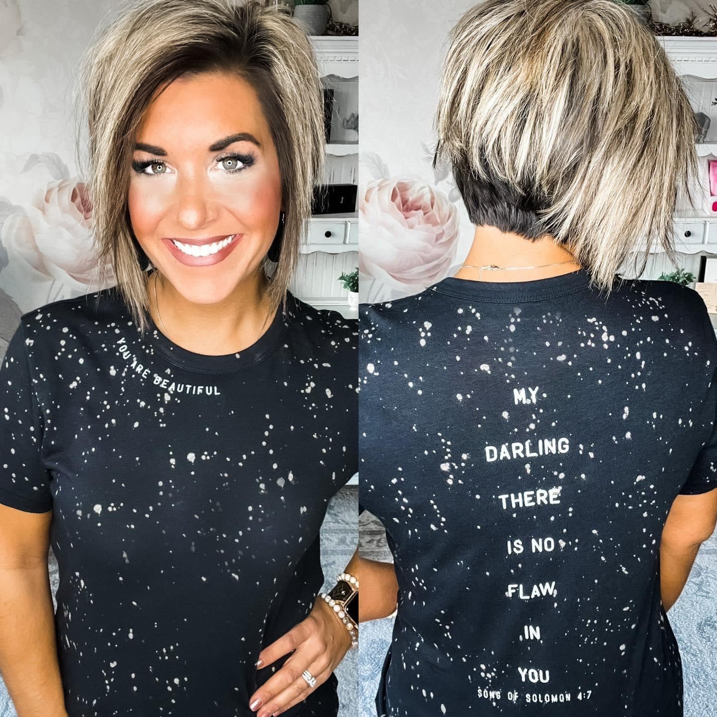 A person wearing a black bleached tee with the text 'you are beautiful' on the front and a Bible verse on the back, My Darling There is No Flaw in You. Song of Solomon 4:7