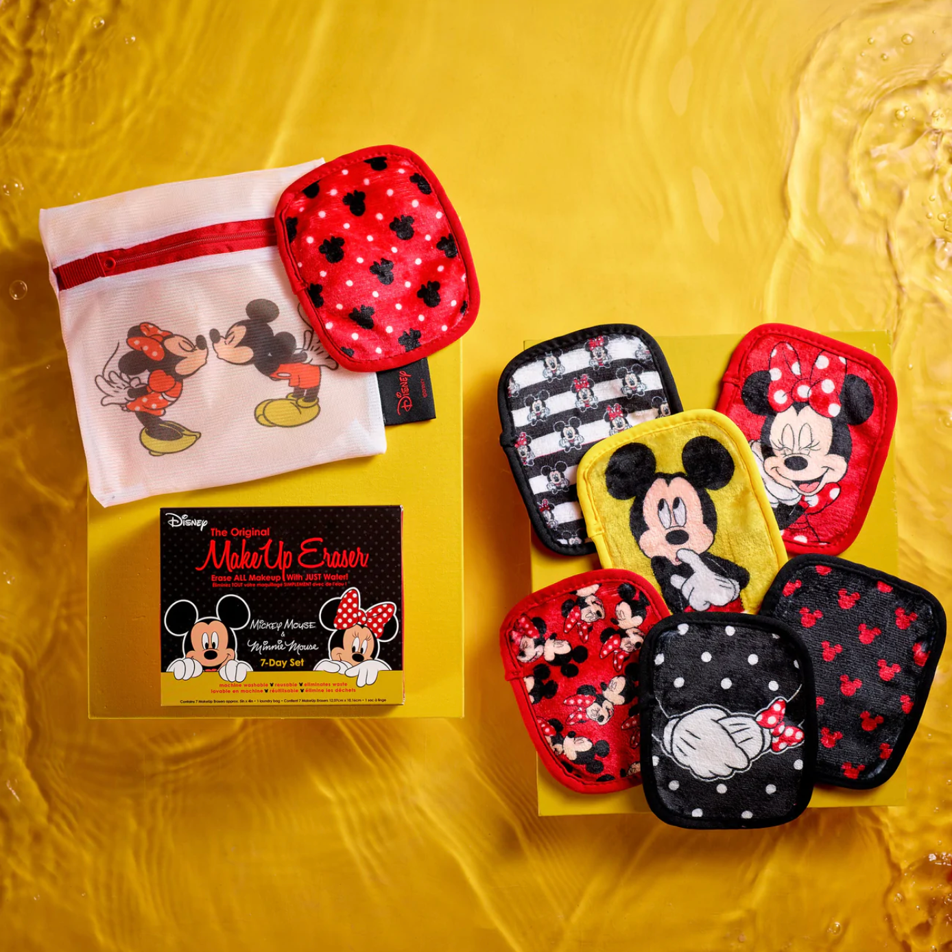 A set of seven Minnie and Mickey Mouse makeup erasers displayed with a laundry bag and the product box.