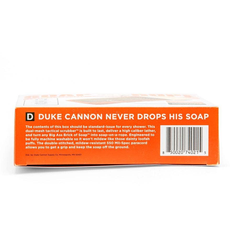 Duke Cannon never drops his soap
The contents of this box should be standard issue for every shower. This duel mesh tactical scrubber is built to last, deliver a high caliber lather, and turn any Big Ass Brick of Soap into soap on a rope. Engineered to be fully machine washable so it won't mildew like those daily loofah puffs. The double stitched, mildew resistant 550 MIL Spec paracord allows you to get a grip and keep the soap off the ground.