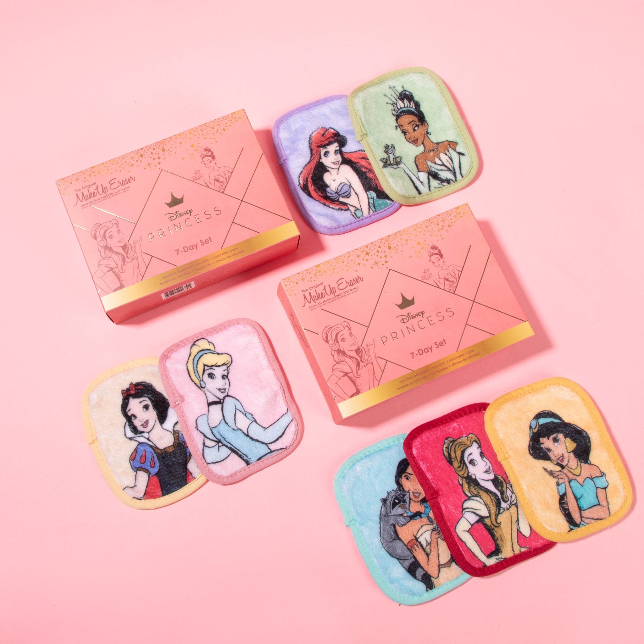 A collection of seven small rectangular makeup remover cloths with Disney Princess character illustrations on each. They are displayed with the Disney Princess 7 Day Set Makeup Eraser box.