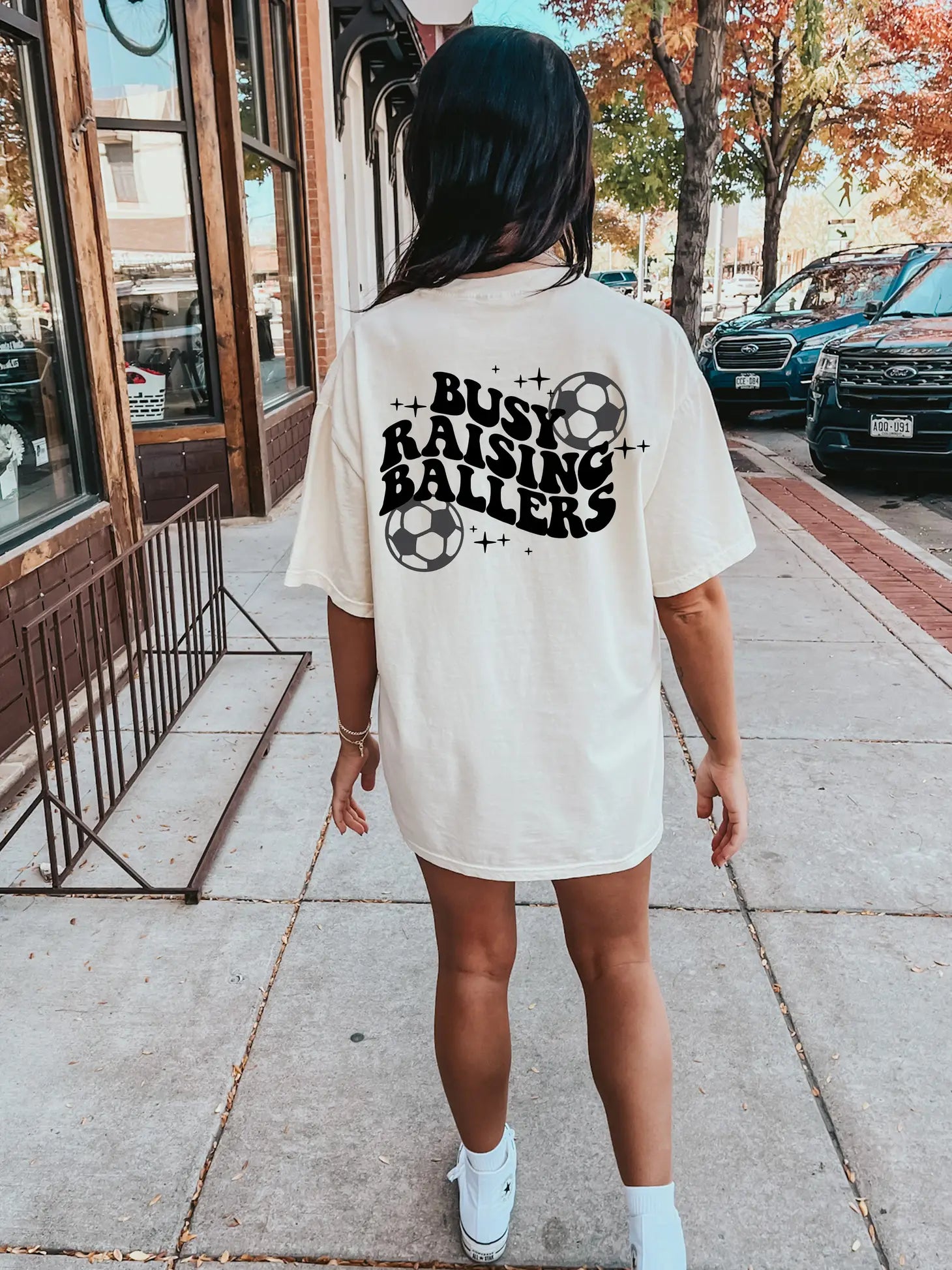Busy Raising Ballers Soccer Graphic Tee