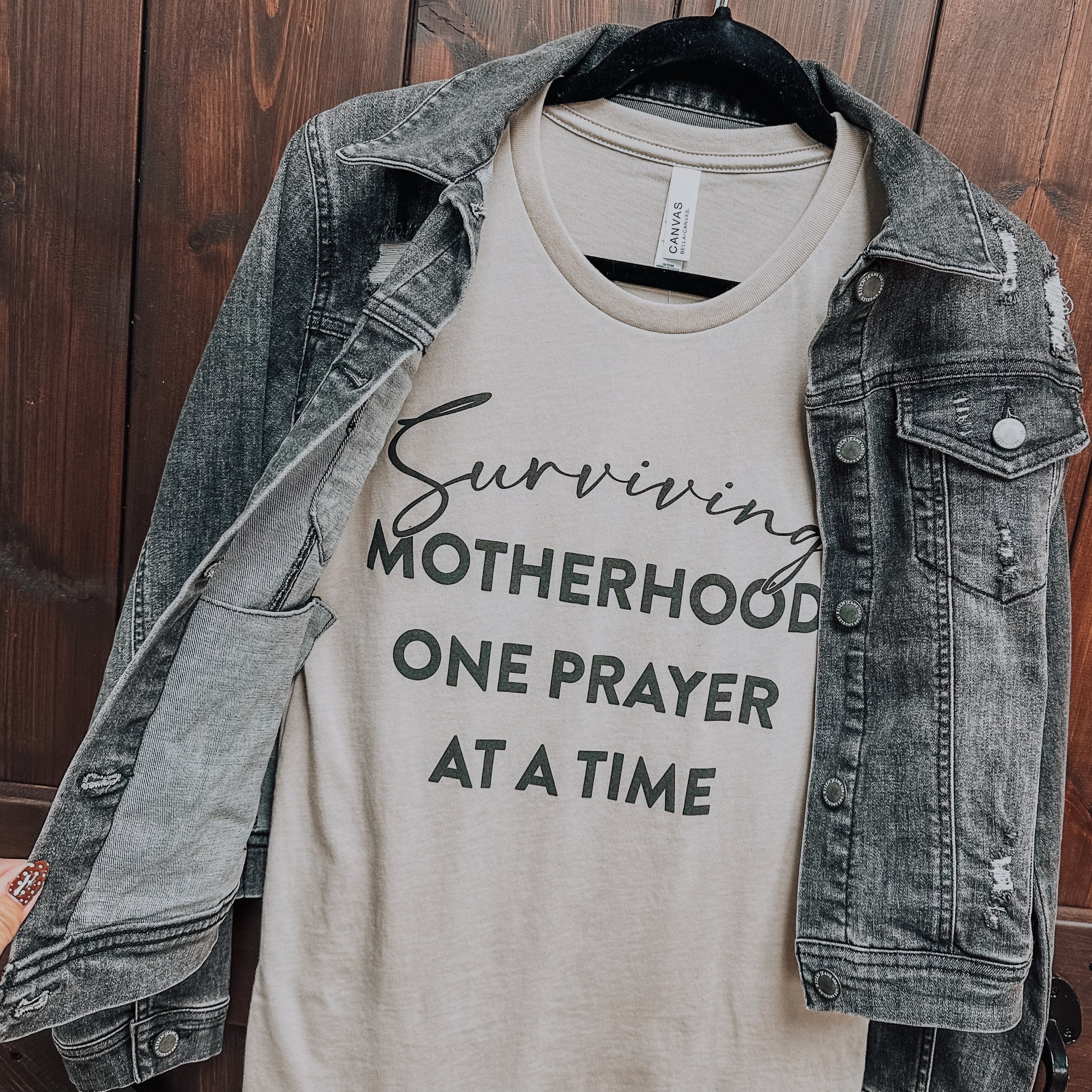 Surviving Motherhood Graphic Tee