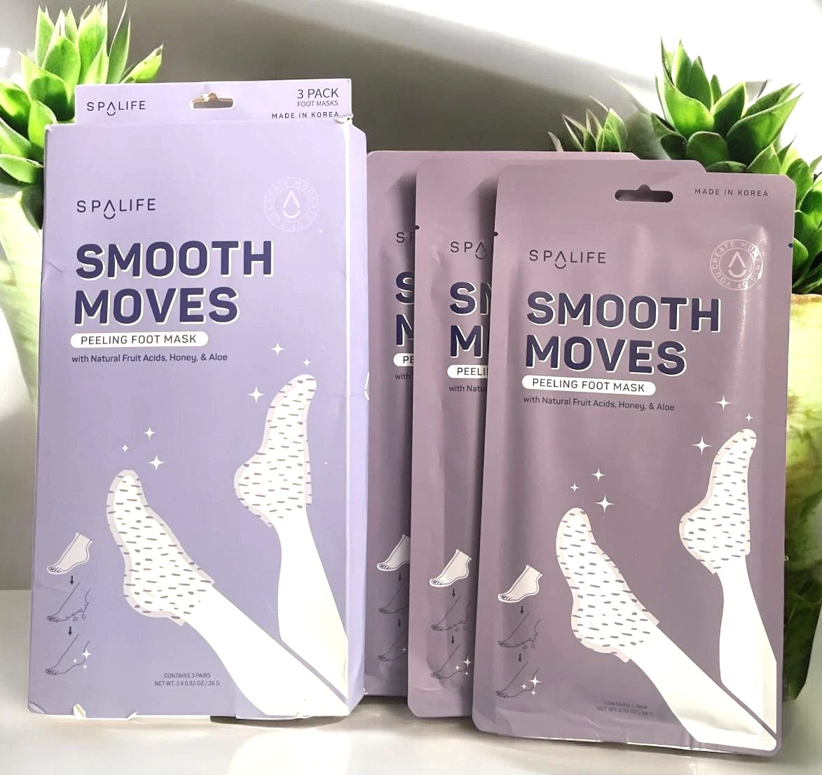 Smooth Moves Peeling Foot Mask with natural fruit acids, honey and aloe.